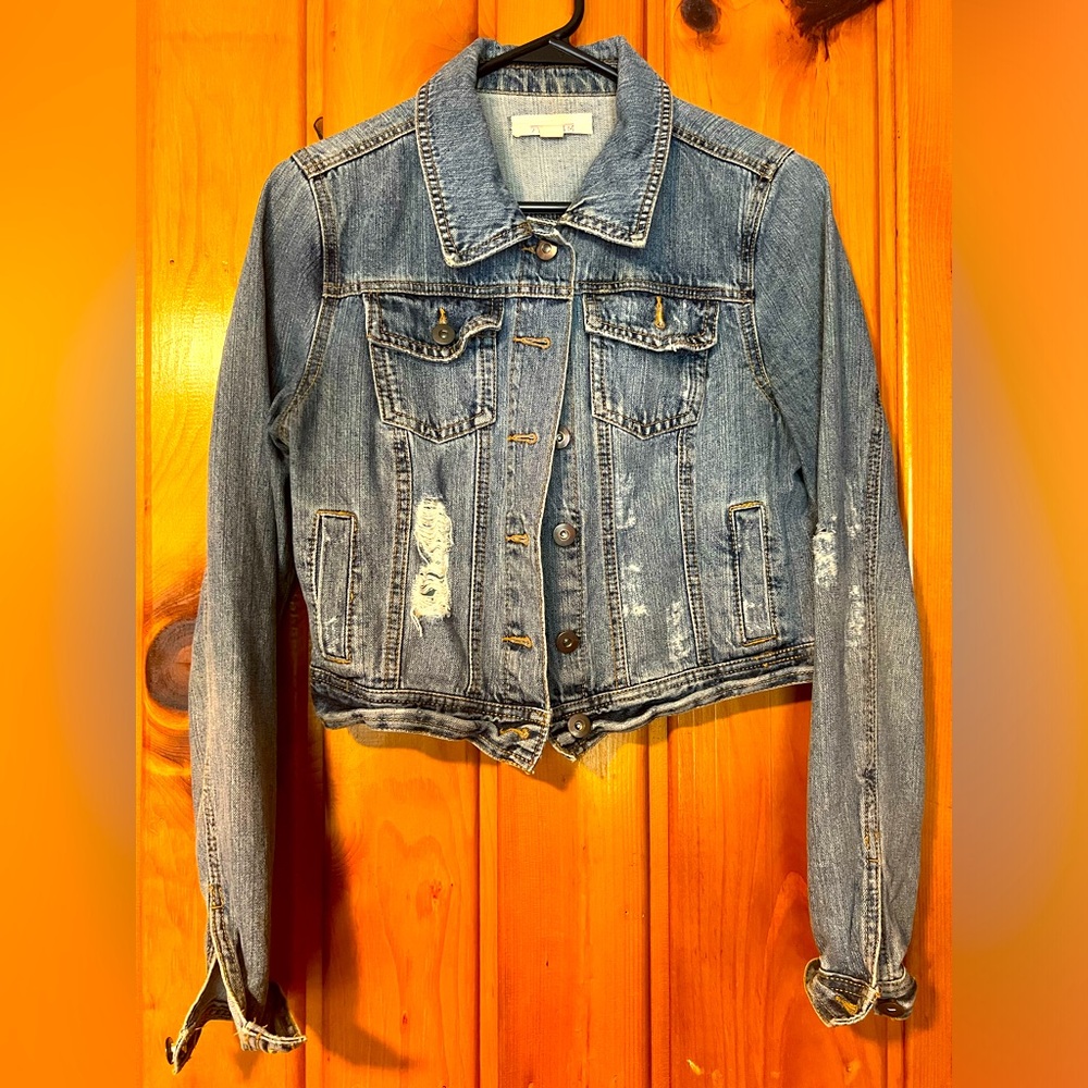 Adorable Jean jacket. Great shape just fits a little snug for my liking.